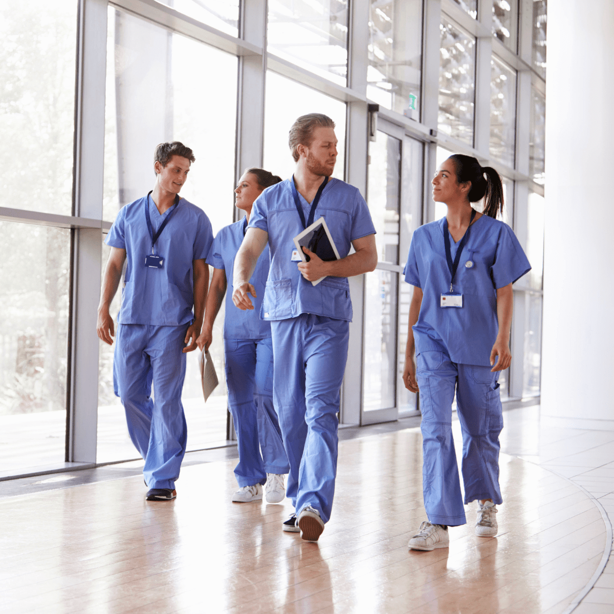 Diverse allied health professionals collaborating in a clinical setting during National Allied Health Professions Week